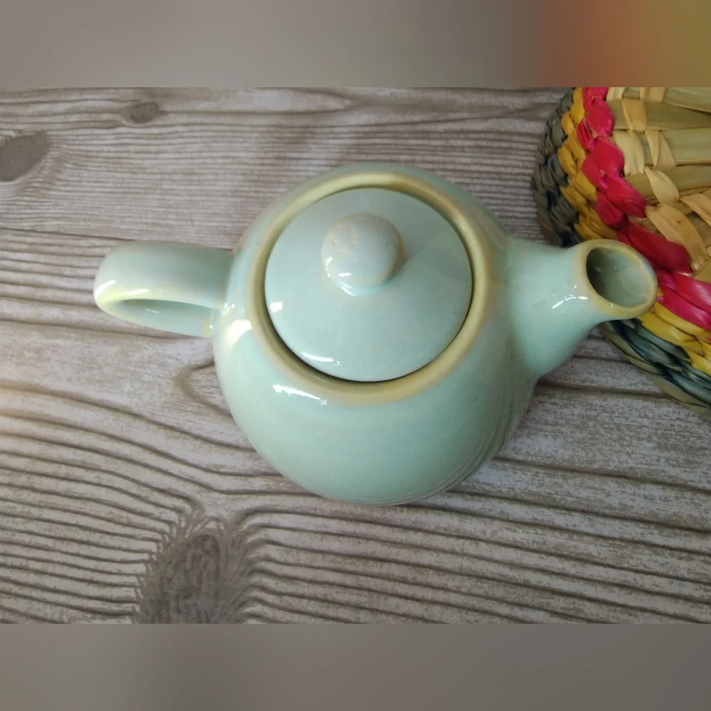 Pier One stoneware personal stackable tea pot, green color.